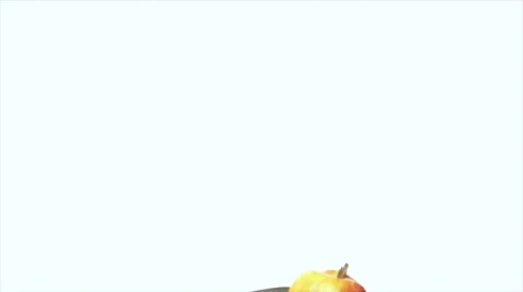 Attractive woman cutting an apple Stock Footage 8654341