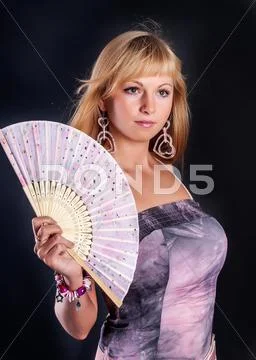 Attractive Woman With Fan