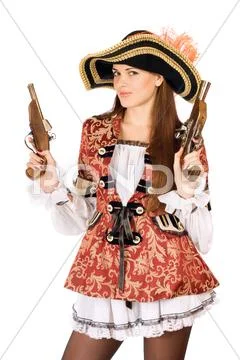 Attractive woman with guns dressed as pirates Stock Photos