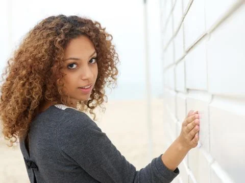 Attractive woman looking over shoulder Foto stock