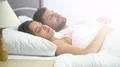 The attractive woman sleeping near the man on the bed 4k or 4k+ Resolution