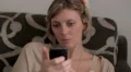attractive woman surfing the Internet with smartphones HD Footage