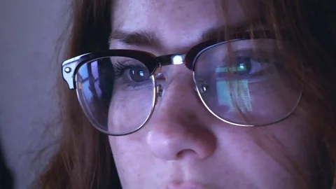 Attractive woman using technology touchscreen glasses reflection slow motion  Stock Footage 77837011