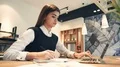 The attractive woman working at the desktop with a modern laptop 4k or 4k+ Resolution