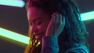 Attractive Young African American Lady Posing In Neon Lights, Posing Over Club Stock Footage