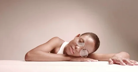 Attractive young black model in aviator glasses Stock Footage 81350254