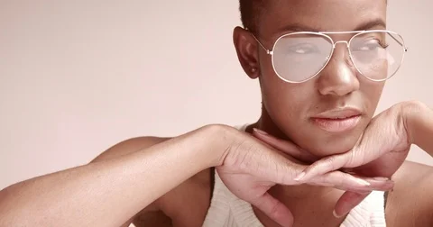 Attractive young black model in aviator glasses Video stock 81350267