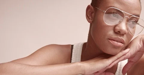 Attractive young black model in aviator glasses Stock Footage 81350310