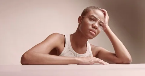 Attractive young black model in aviator glasses Stock Footage 81350348