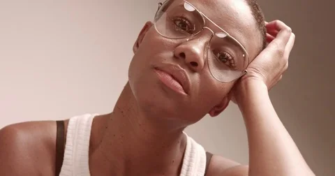 Attractive young black model in aviator glasses Stock Footage 81350523