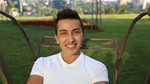 Attractive young boy smiling camera Stock Footage 25421807