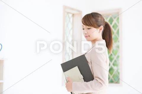 Attractive young businesswoman Stock Photos