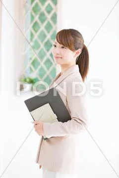 Attractive young businesswoman Stock Photos