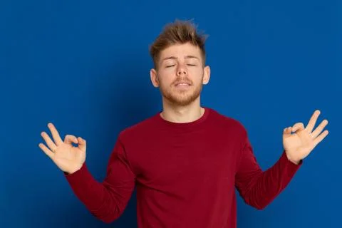 Attractive young guy with a red T-shirt Stock Photos