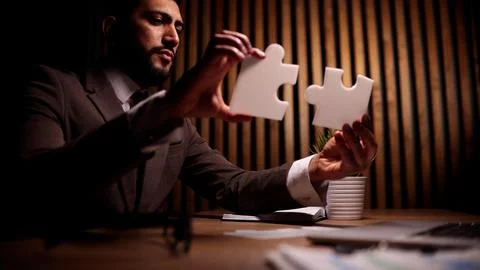 Attractive young guy is solving a problem 写真素材