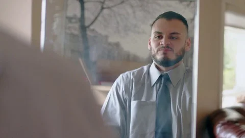 Attractive young hispanic being pretending to draw a gun in front of mirror Stock Footage 84487740