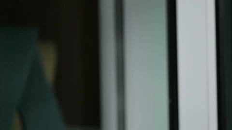 Attractive young man entering from his office after long day at work Stock Footage 64112257
