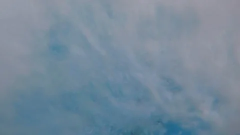 Attractive young man playing in a pool in summer Vidéo 106309926