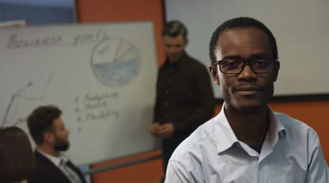 Attractive young man posing on his office Stock Footage 68335722