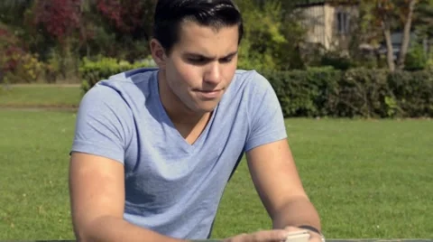 Attractive young man texting Stock Footage 42675634