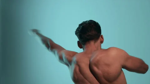 The attractive young man is training boxing indoor. slow motion Stock Footage 148781380