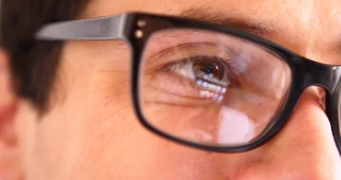 Attractive young man using smart phone reflection eye glasses hipster concept Stock Footage 91940850