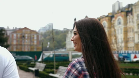 Attractive young man in white t-shirt and brunette woman on romantic date Stock Footage 63177961