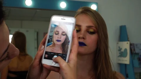 Attractive young model in bright bold makeup total look smoky eyes eyeshadow Stock Footage 102735185