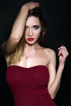 Attractive young model with red lips and bright make-up Stock Photos
