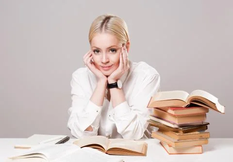Attractive young student reading. Stock Photos