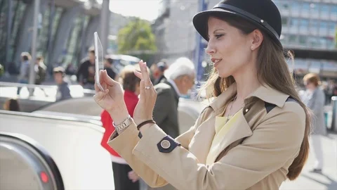 Attractive Young Stylish Female Using Tablet Screen Computer in the City Stock Footage 90597465
