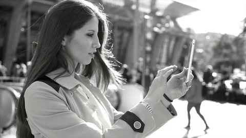 Attractive Young Stylish Female Using Tablet Screen Computer in the City Stock Footage 90597664