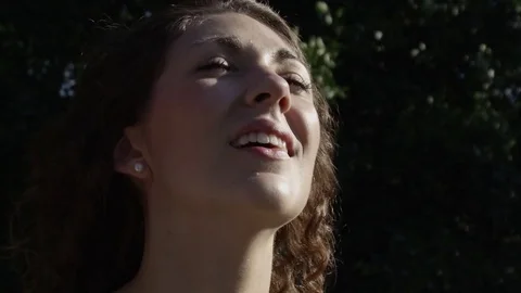 Attractive Young Woman's Face Looking At Drone In Super Slow Motion Stock Footage 82593244