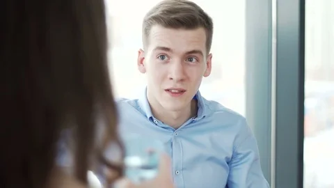 Attractive young worker speak emotionally during business conversation Stock Footage 73548084