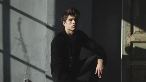 Attrective Man try to poses on camera Stock Footage 60961247