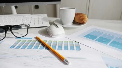 Attributes of a businessman on the table Stock-Footage 96735374