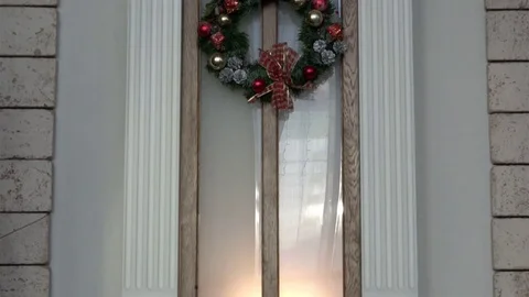 The attributes of the New Year's decorations on the facades of houses and Stock Footage 70232886