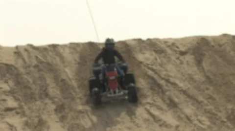 ATV Coasting Down Sand Dune 스톡 동영상 5087154