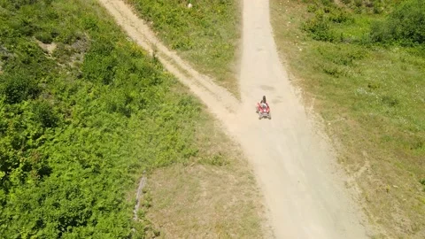 ATV on a dirt road Stock Footage 157410684