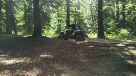 ATV on a dirt road Stock Footage 157411390