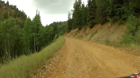 ATV drive on mountain forest service dirt road HD 006 Stock Footage 11958624