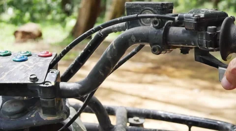 ATV drive through mud puddle Stock Footage 64331031