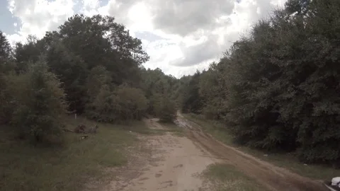 ATV Goes Through Puddle 02 Stockbeeldmateriaal 78070413