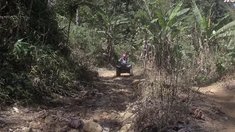 ATV going up slowly Stock Footage 83458149