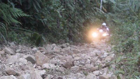ATV going up on a trail Stock Footage 83458490