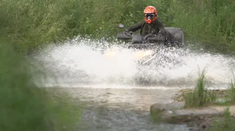 ATV in mountain river 스톡 동영상 40544630