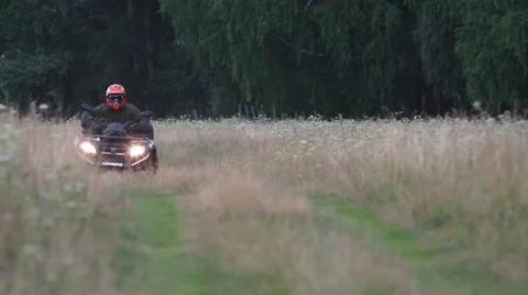 ATV on muddy road in rain 動画素材 40545143