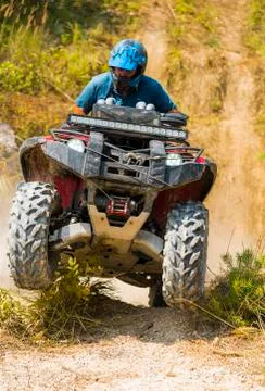 ATV overcomes the track Stock Photos