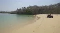 An ATV parked on the beach in Panama 4k or 4k+ Resolution