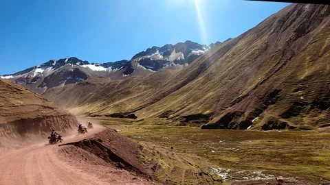 ATV quad bikes riding through the spectacular Andes mountains Video stock 344306191